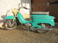 Dokonale zachovalý motocykl Jawa 21 Sport (Pionýr) v tyrkysové barvě z roku 1969
